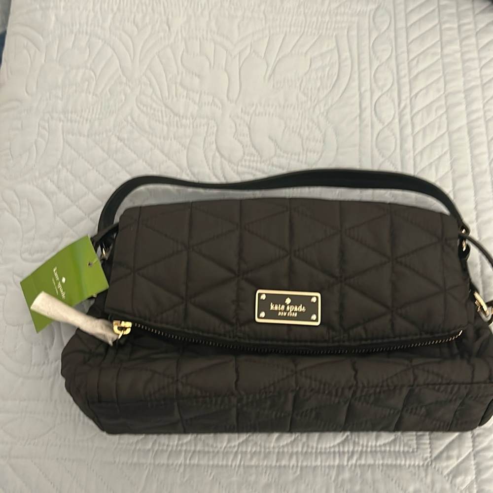 NWT Kate Spade purse. Black quilted with two compartments.